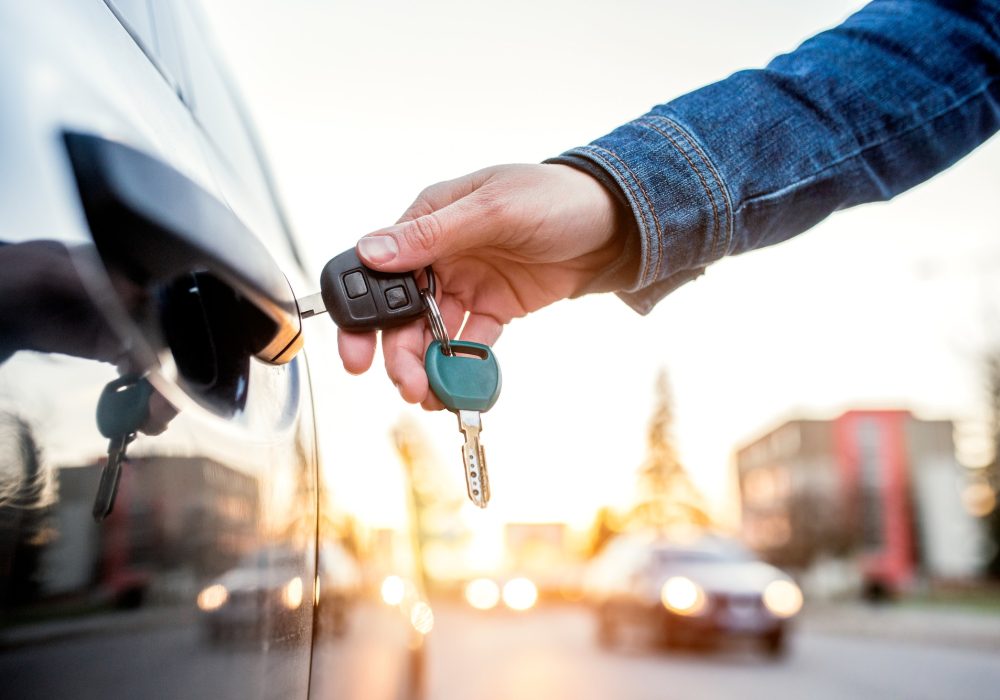 Woman with car key